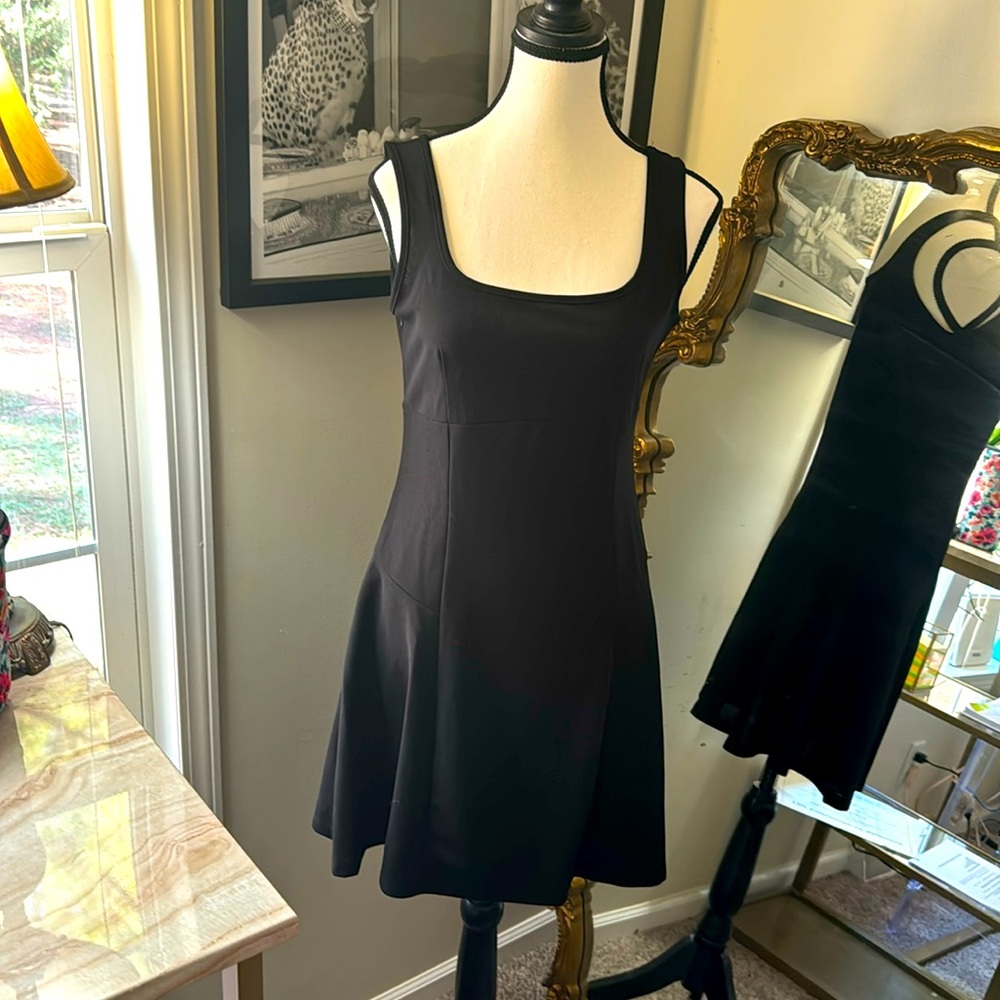 Simple black skater style timeless dress